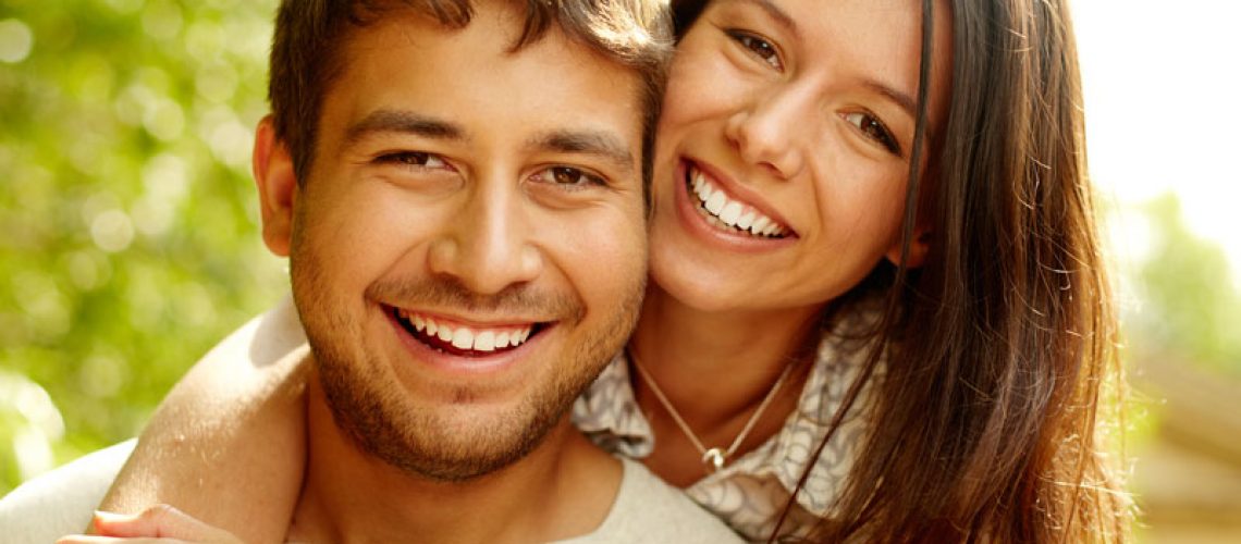 Dental Patients Smiling With Well Cared For Dental Implants In Allen, TX